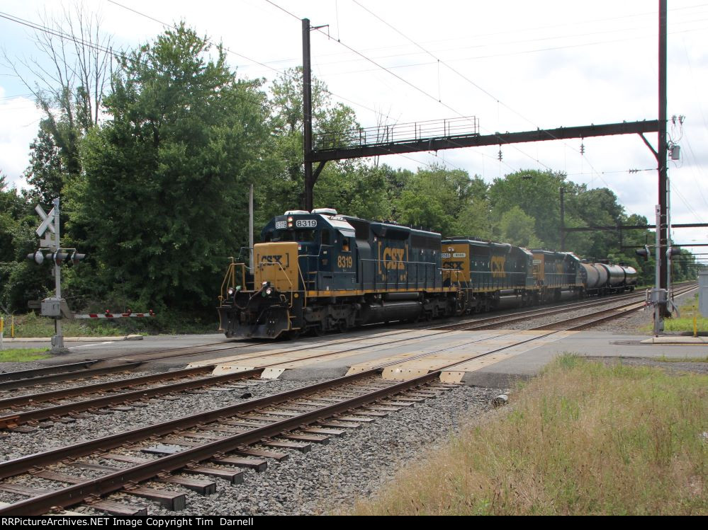 CSX 8319 leads L042 heading to Manville Yard